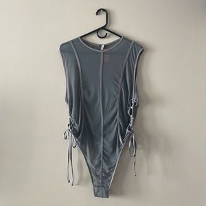 Gray sheer bodysuit. Brand: Unfashional.